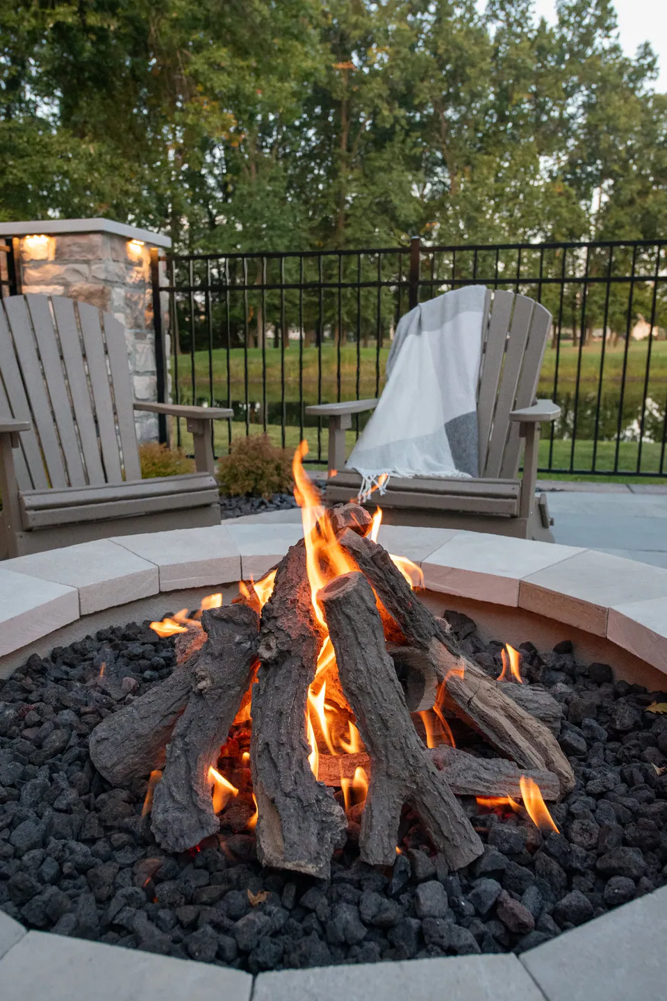 Pool edge with planting and hardscape transition in a Blacklick backyard